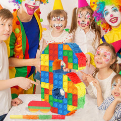 Hooqict 6th birthday pinata used as festive photo prop and party centerpiece.