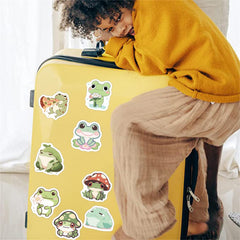 Hopetl frog stickers in a scrapbook; playful and easy to apply.