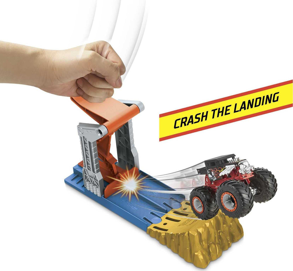 Hot Wheels 164-scale monster-truck in mid-air during a launch.