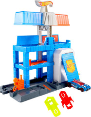 Hot Wheels City Downtown Police Tower Playset with three levels for dramatic vehicle action.
