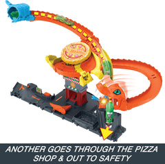 Hot Wheels City pizza pie hit cobra face adds playful chaos.