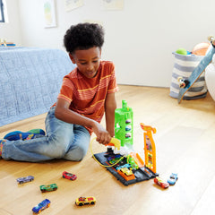 Hot Wheels City Super Recharge Fuel Station launcher action boosts dynamic play sessions.