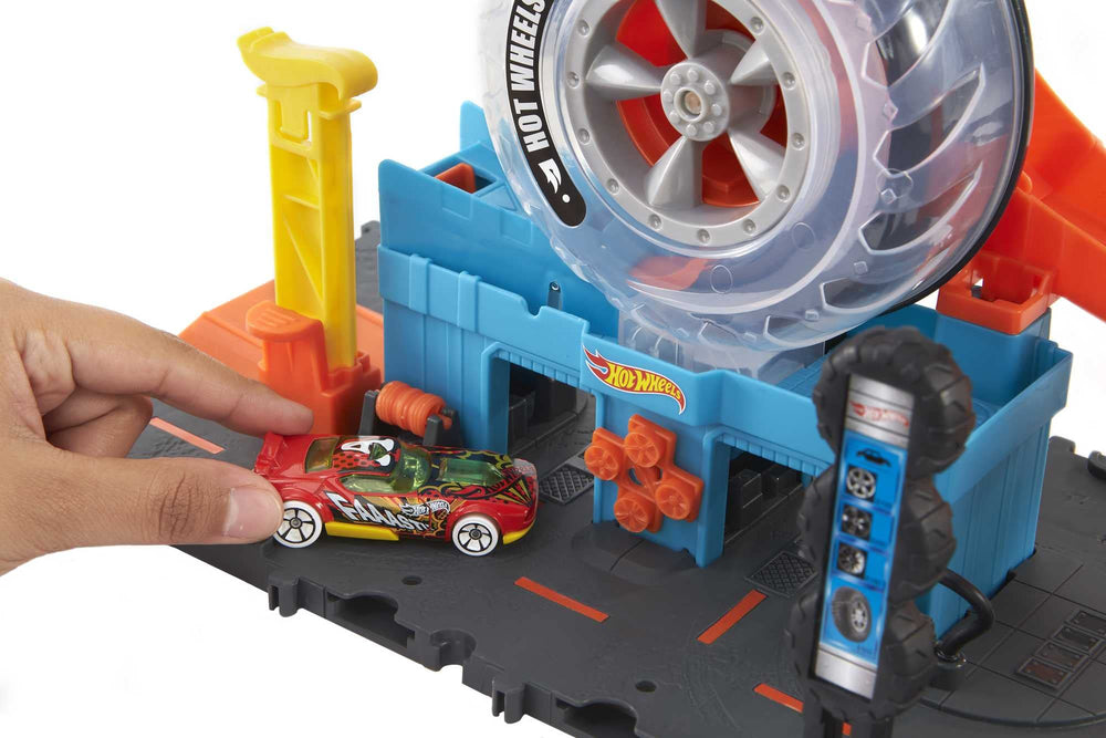 Hot Wheels City Super Twist Tire Shop car on lift ready to enter tires