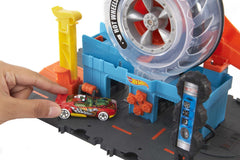 Hot Wheels City Super Twist Tire Shop car on lift ready to enter tires