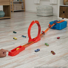 Hot Wheels Flame Loop Stunt enables thrilling loop action during races.