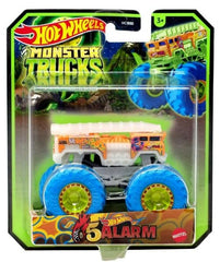 Hot Wheels Glow Monster Truck 1:64 with glow-in-the-dark accents for night-time play