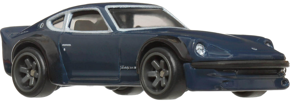 Nissan Fairlady Z wheel detail with Real Riders tires for realistic rolling.