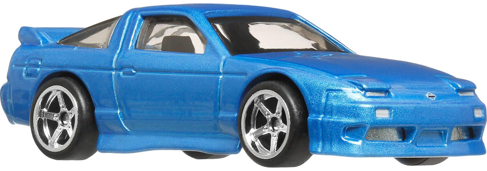 Hot Wheels Premium Fast & Furious 1:64 car, side view highlights sleek silhouette.