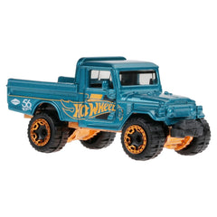 Hot Wheels Toyota Land Cruiser teal and gold side view, detailed exterior for collectors.