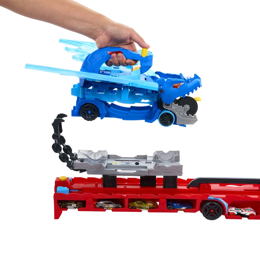 Hot Wheels Ultimate Dual Dragon Transporter includes two die-cast cars for immediate play