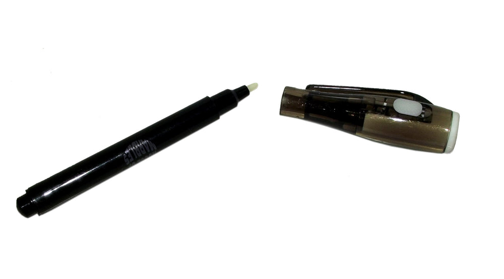 House of Marbles invisible ink UV light spy pen in use reveals messages with UV light