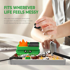 Interactive chaos: arranging pieces in HouseBegan dumpster fire zen garden.