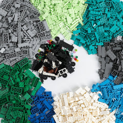 HUIZDQ 1800Pcs bricks in blue, green and white for colorful building play.