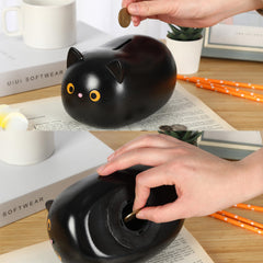 H&W Black Cat Piggy Bank makes a gift-ready keepsake for kids' birthdays.