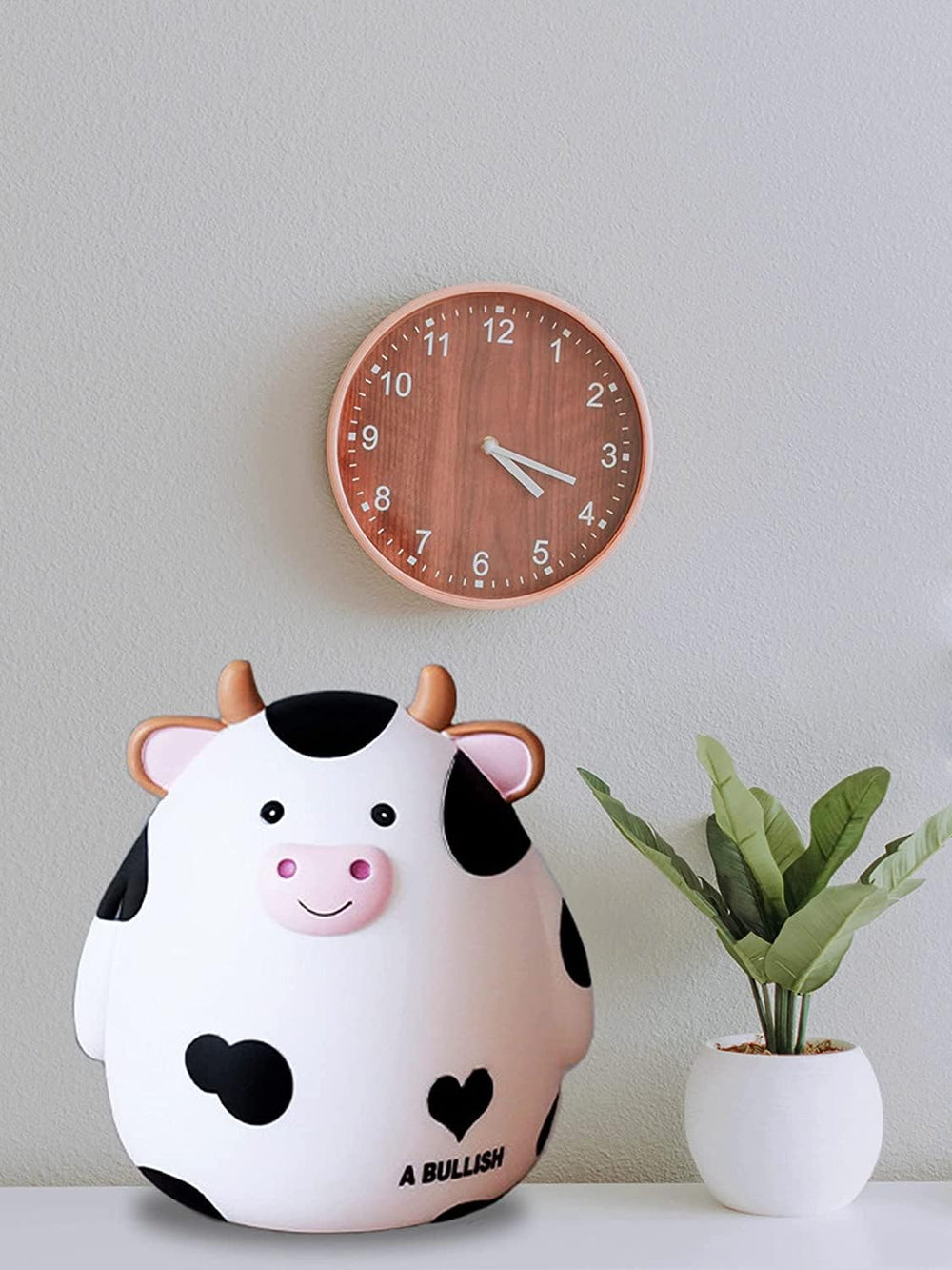 HW Cow Piggy Bank bottom stopper; safe access to saved money.