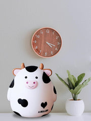 HW Cow Piggy Bank bottom stopper; safe access to saved money.