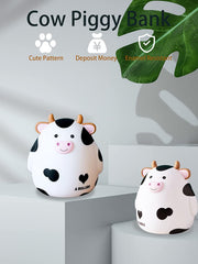 HW Cow Piggy Bank dimensions; compact size for shelves and desks.