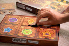 Identity Games Secret of the Scientist box art, atmospheric design builds anticipation.