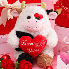 IKASA cow plush close-up shows soft fur and inviting hug.