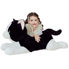 IKASA giant cat tuxedo plush, 30-inch cuddle buddy for cozy bedroom decor.