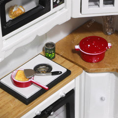 iland stand with five spatulas and spoons supports tidy miniature setups