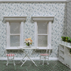 iLAND Cotton-backed wallpaper with blue roses provides smooth application and wrinkle resistance.