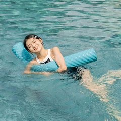 IMMERSA teal pool noodle coating close-up, durable surface for sun and salt