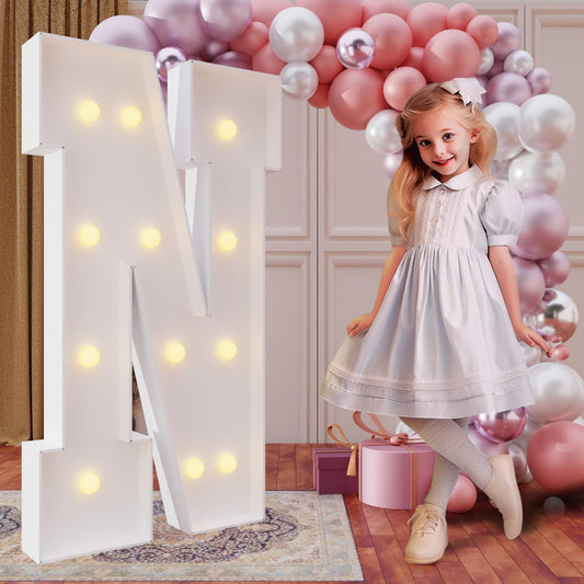 imprsv 4ft marquee letter N used as birthday decor with warm backlight