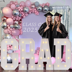 imprsv marquee letter P glowing at night in a baby shower setting