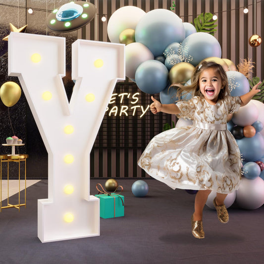 Imprsv marquee Y letter with glowing bulbs, ideal as a party backdrop.