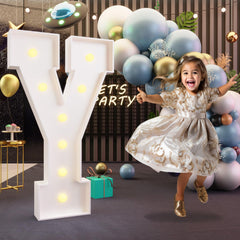 Imprsv marquee Y letter with glowing bulbs, ideal as a party backdrop.