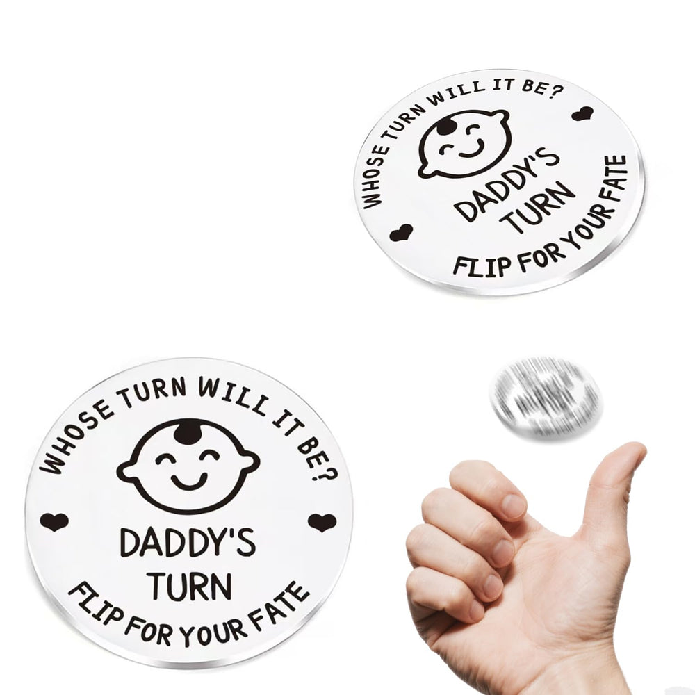 Infanote decision coin in hand for quick baby care decisions