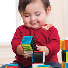 Infantino Press & Stay blocks allow stacking and sideways building for versatile play.