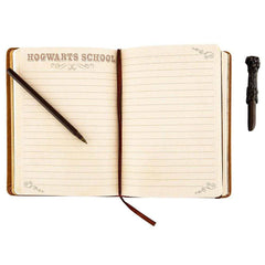 Innovative Designs Harry Potter wand pen shown with journal for magical writing