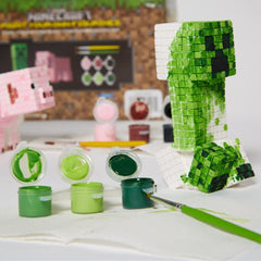 Innovative Designs Creeper figurine ready for painting with vibrant details.