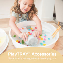 Inspire My Play coral nesting bowls during water play for sensory exploration.