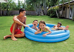 Intex Crystal Blue pool during playtime with kids enjoying water fun in the yard.