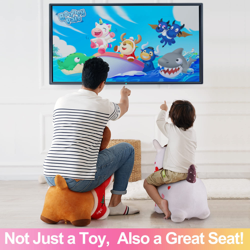 iPlay Bouncy Pals child riding action demonstrates interactive play.