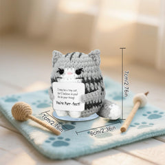 IrisCargo cat with inspirational card for daily encouragement.