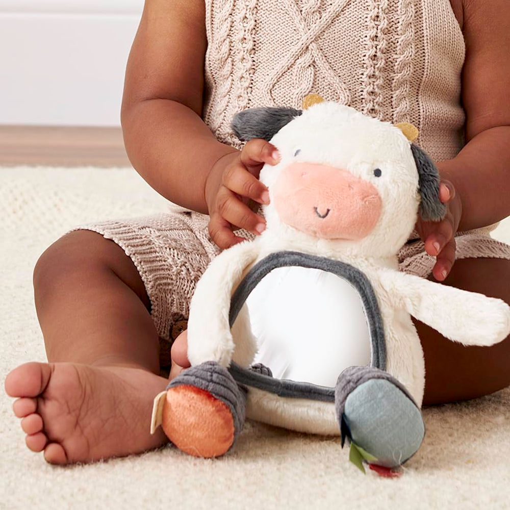 Itzy Ritzy attaches to car seats or strollers for on-the-go play