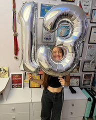 IWERP 13th birthday decor setup demonstrates bold numeral centerpiece