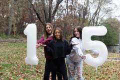 IWERP 40-inch number balloon adds focal point for fifth birthday celebrations.