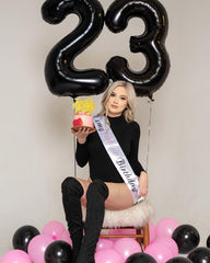 IWERP black balloon with gold accents elevates decor and photo moments.