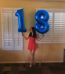 IWERP blue foil 18-number balloon decor adds elegant birthday ambiance.