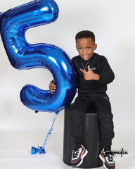 IWERP blue party decor complements themes and photo ops at anniversaries.