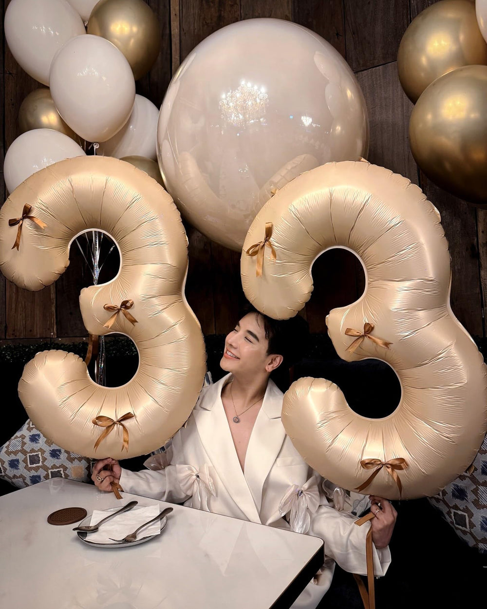 IWERP brown foil-number-2 balloon creates a bold centerpiece.