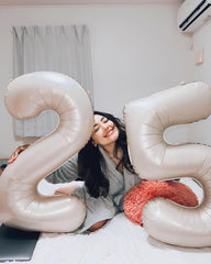 IWERP cream number 25 balloon 40 inch serves as a striking centerpiece.