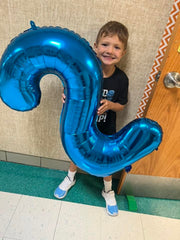 IWERP navy blue foil number 2 balloon adds festive flair.
