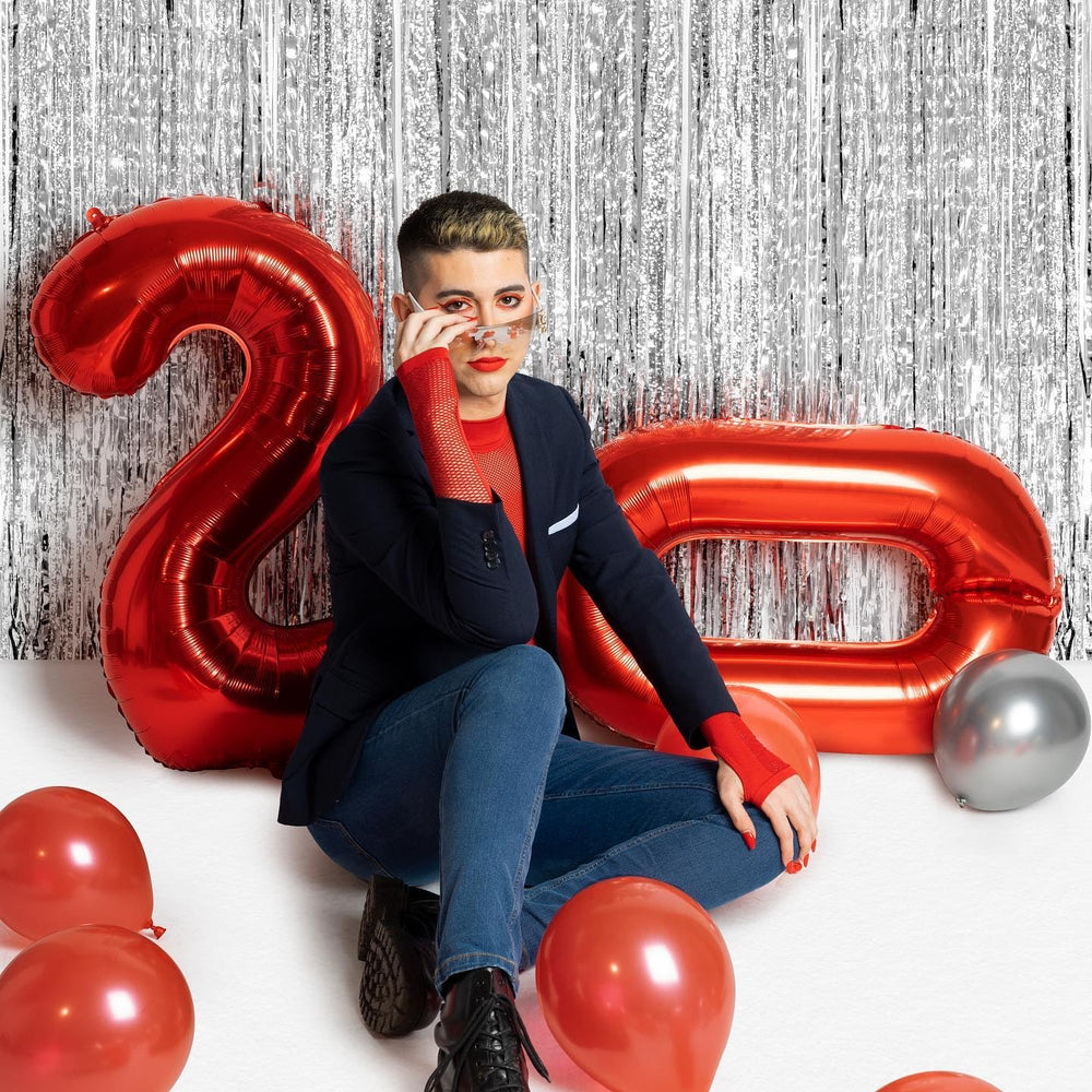 IWERP giant 40-inch number balloon creates a striking stage backdrop.