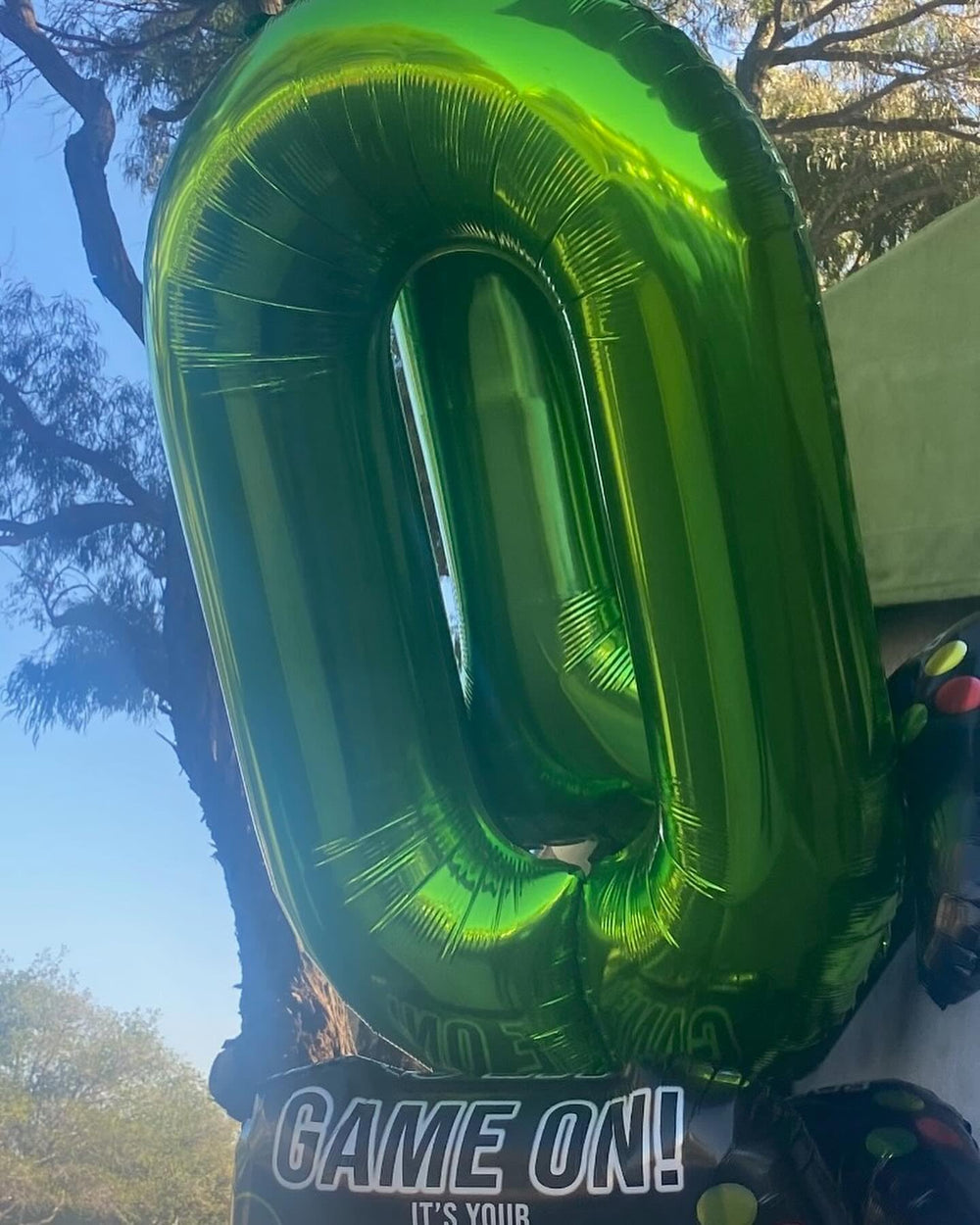 IWERP green zero-number balloon at the entrance for festive vibe.